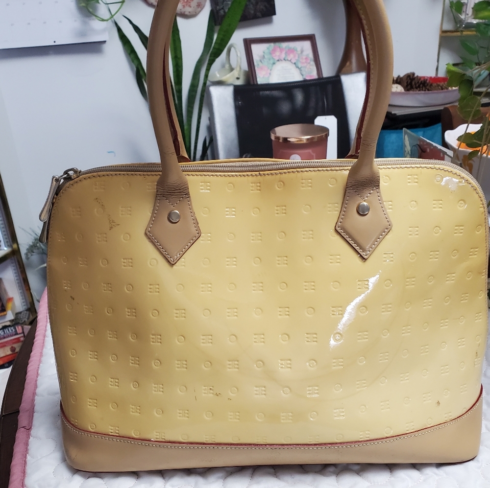 Arcadia yellow 💛 patent leather handbag.